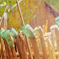 Beekeeper working with hives